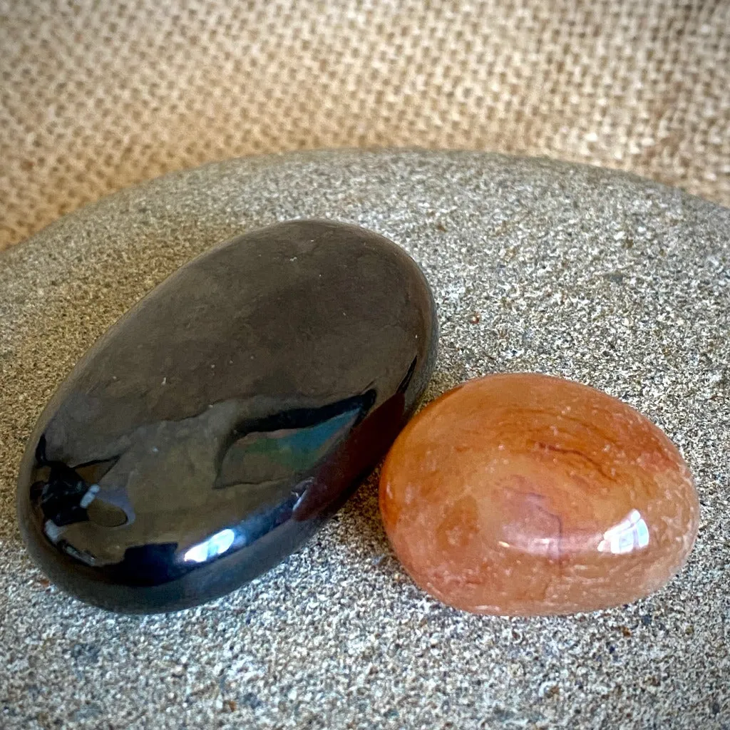 Shungite Palm Stone with Carnelian in Elk Leather Neck Pouch